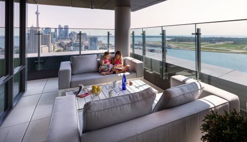 Family Enjoying the Terrace of the Presidential Suite 